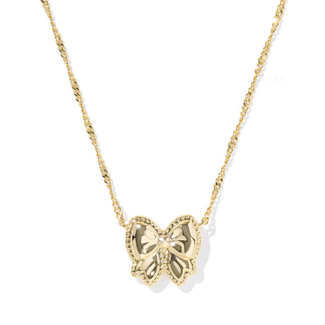 Gold butterfly necklace on a white background