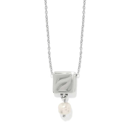 Silver necklace with a square pendant and pearl drop on a white background