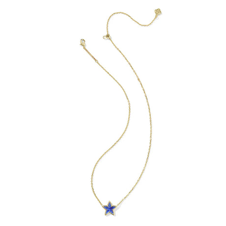Gold necklace with a blue star pendant on a white background