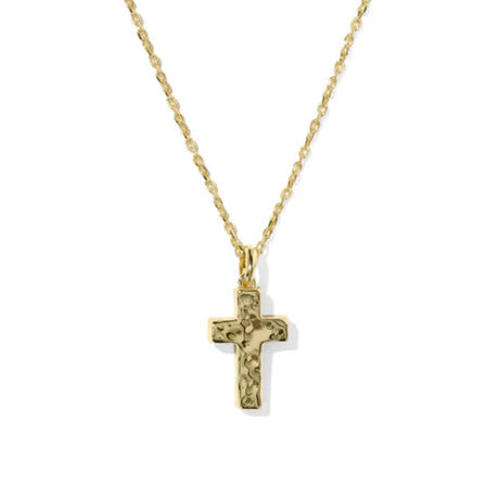 Gold cross necklace on a white background
