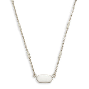 Silver necklace with a large oval pendant on a white background