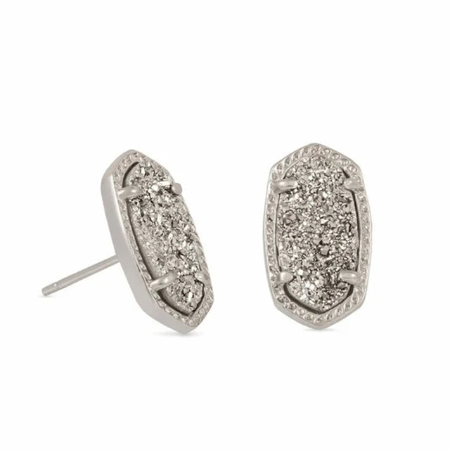 Silver earrings with a textured design on a white background