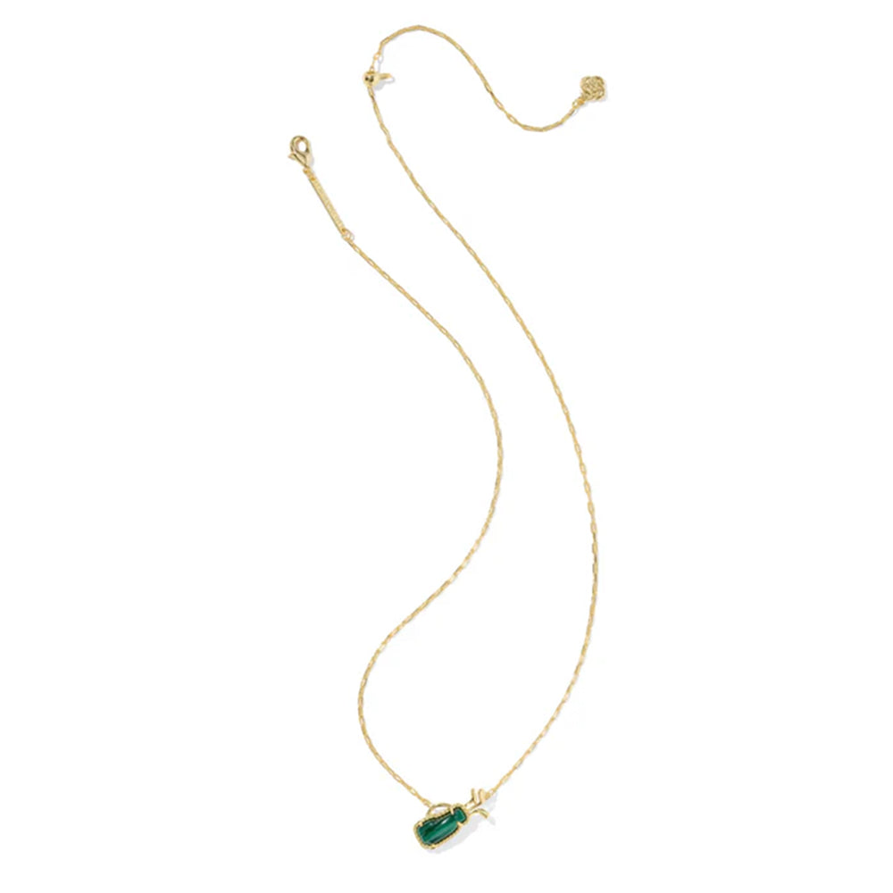 Gold necklace with a green pendant on a white background
