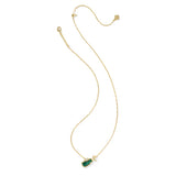 Gold necklace with a green pendant on a white background