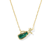 Gold necklace with a green stone pendant on a white background