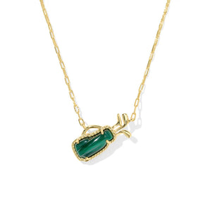 Gold necklace with a green stone pendant on a white background
