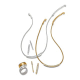 Gold and silver jewelry set including necklaces and a ring on a white background