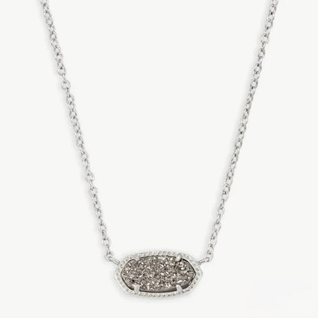 Necklace with a silver chain and an oval pendant on a white background