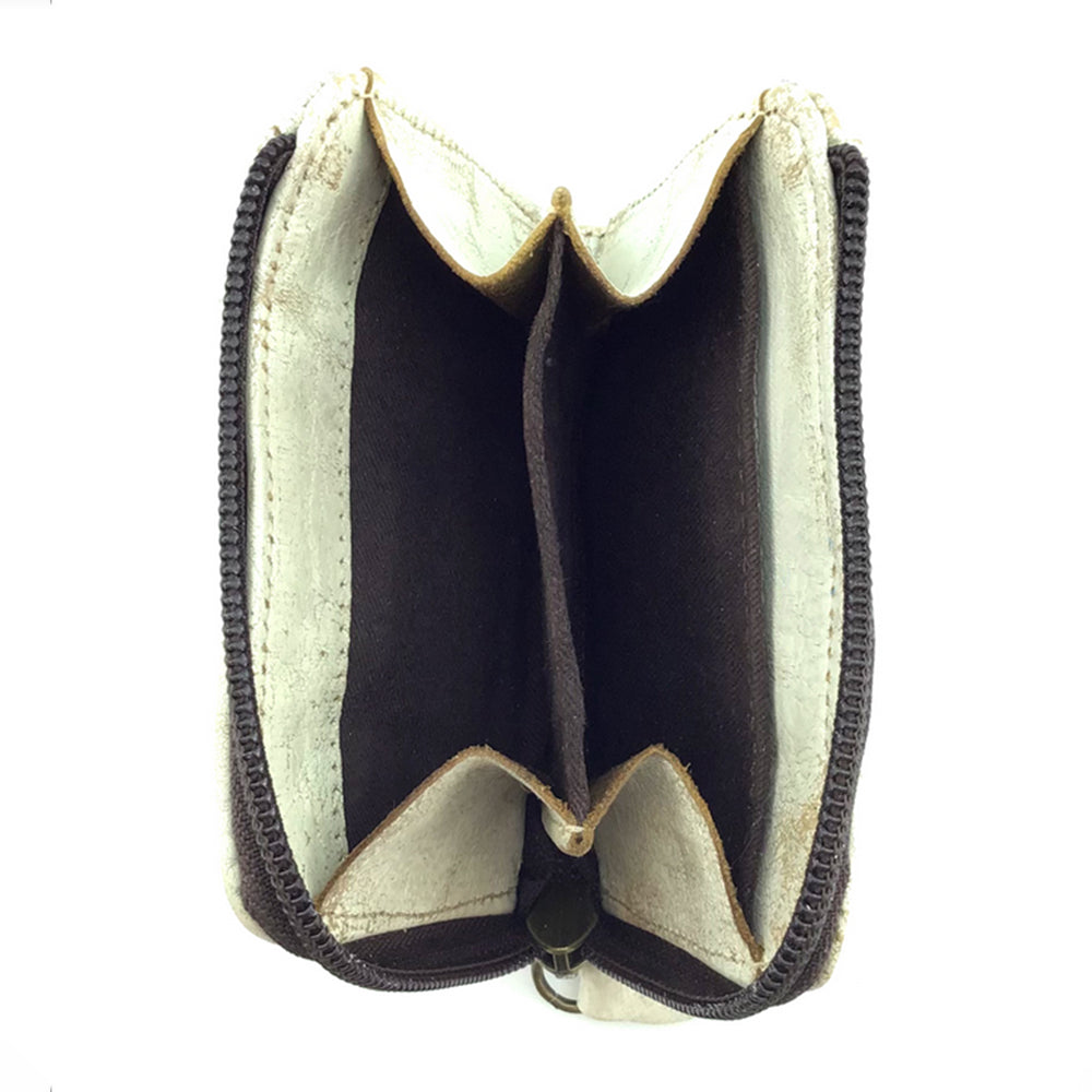 Close-up of a brown and gold wallet on a white background