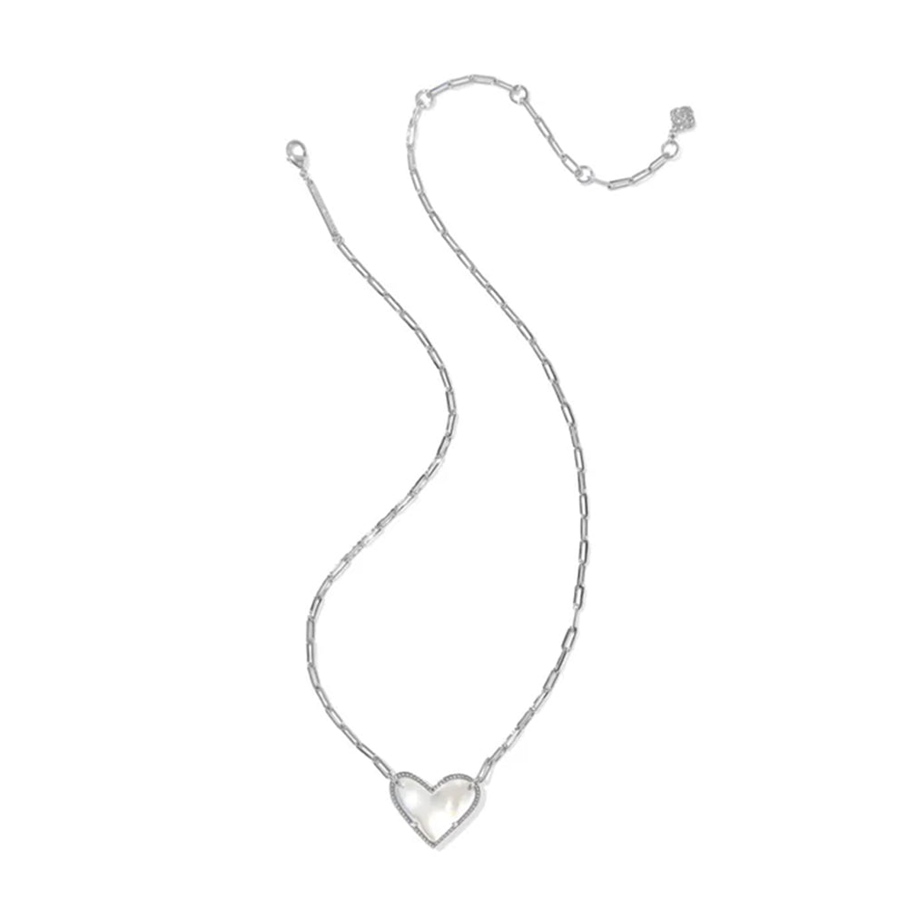 Silver heart-shaped pendant necklace on a white background