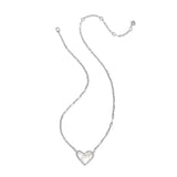 Silver heart-shaped pendant necklace on a white background