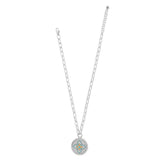 Silver necklace with a round pendant on a white background