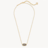 Gold necklace with a pendant on a white background