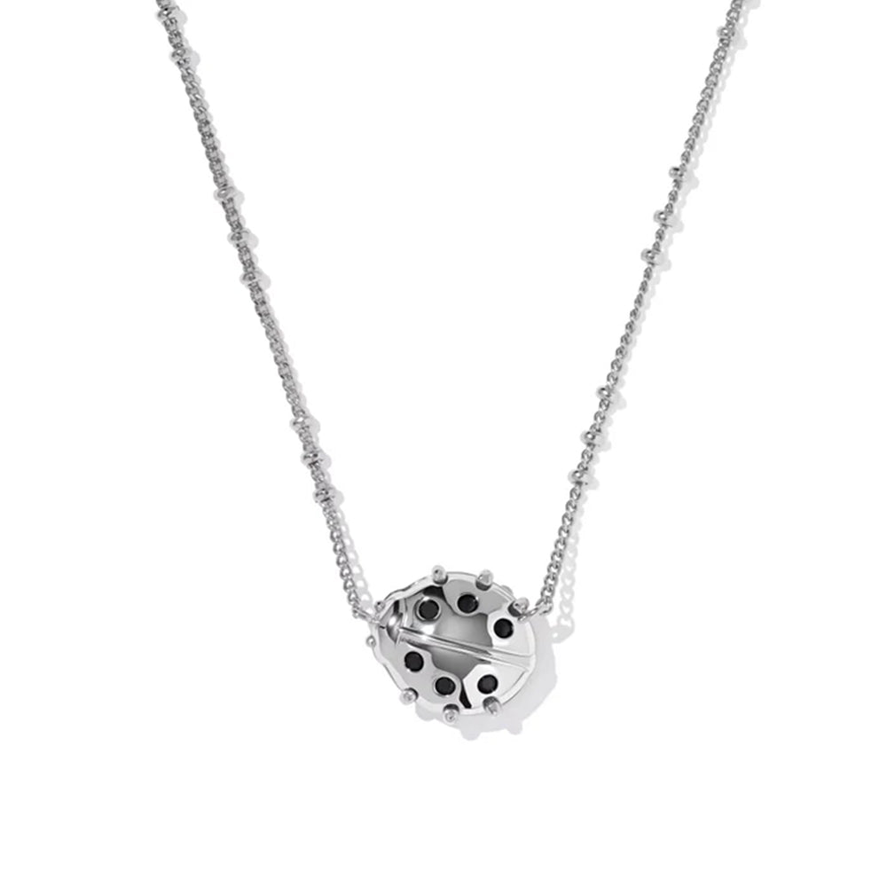 Silver necklace with a unique pendant on a white background