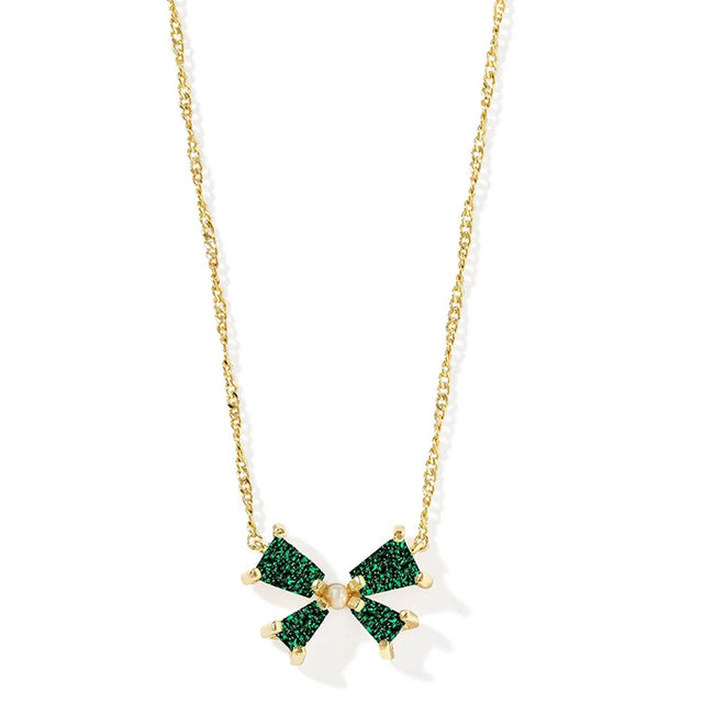 Necklace with green and white pendant on gold chain against a white background