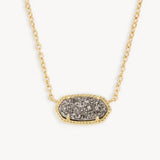 Gold necklace with a gray stone pendant on a white background