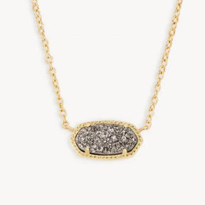Gold necklace with a gray stone pendant on a white background