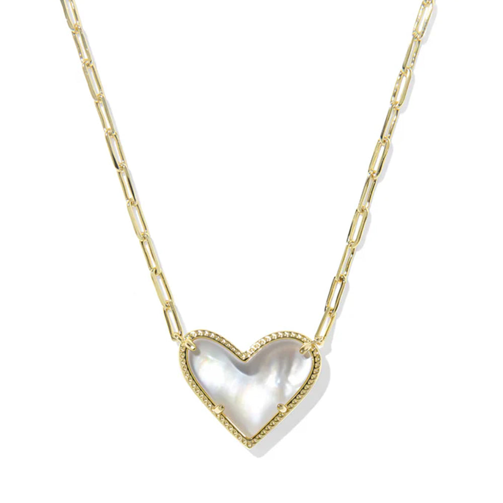 Heart-shaped pendant necklace with gold chain on a white background