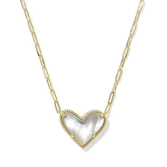 Heart-shaped pendant necklace with gold chain on a white background