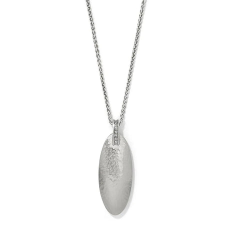 Silver necklace with a textured pendant on a white background