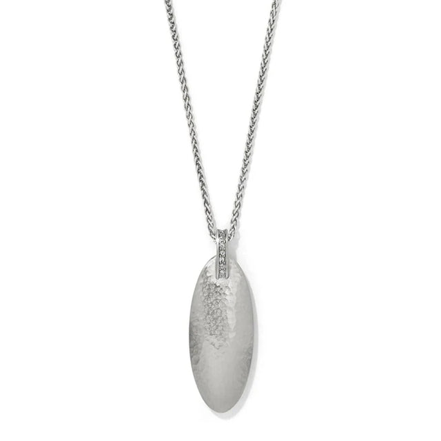 Silver necklace with a textured pendant on a white background