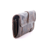 Vintage-style leather clutch bag on a white background