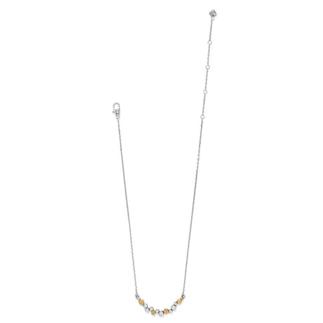 Necklace with small beads on a white background