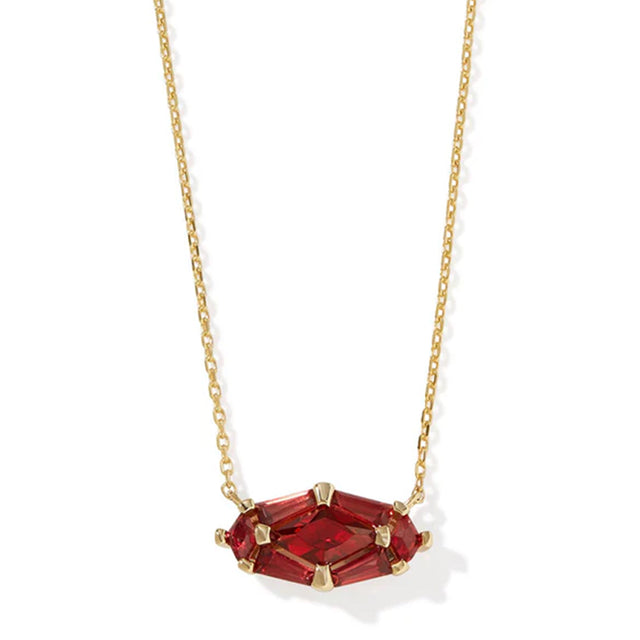 Gold pendant necklace with red crystal