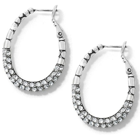 Silver hoop earrings with clear gemstones on a white background