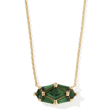 Gold necklace with a green gemstone pendant on a white background