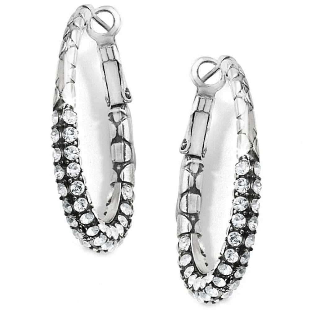 Pair of silver hoop earrings with clear gemstones on a white background