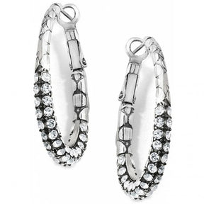 Pair of silver hoop earrings with clear gemstones on a white background