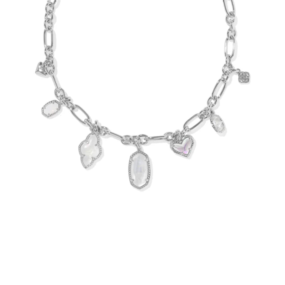 Gold necklace with various charms on a white background