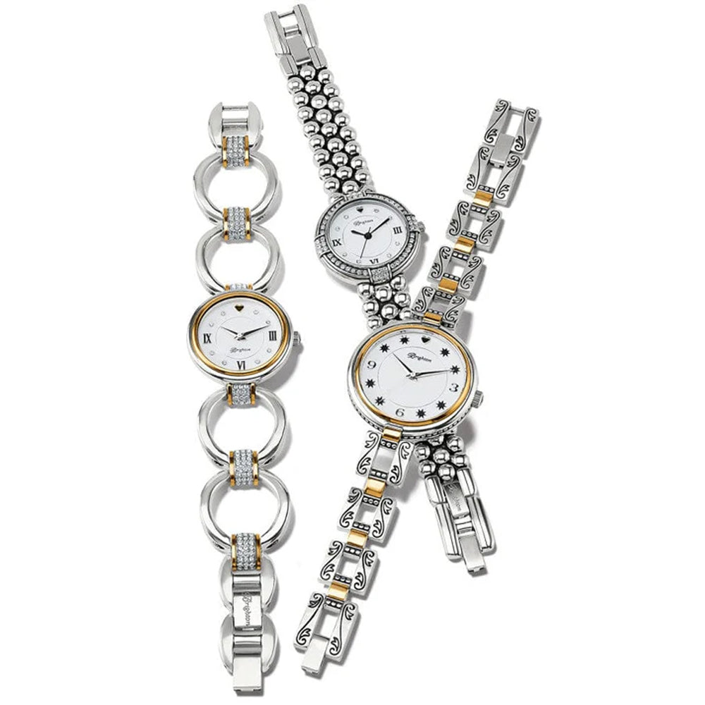 Two silver watches with intricate designs on a white background
