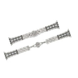 Two silver bracelets on a white background