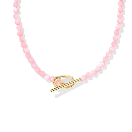 Necklace with pink and white beads and a gold clasp on a white background