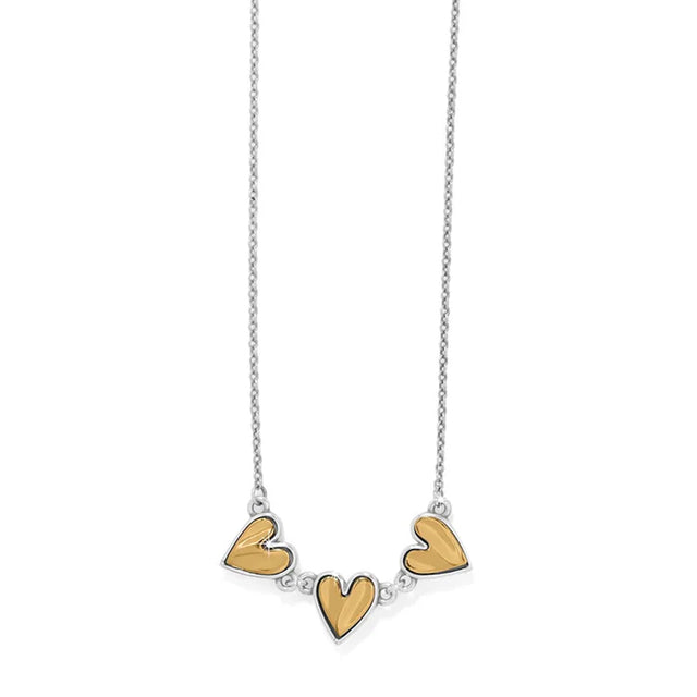 Necklace with three heart-shaped pendants on a white background