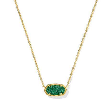 Gold necklace with a green pendant on a white background