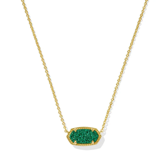 Gold necklace with a green pendant on a white background