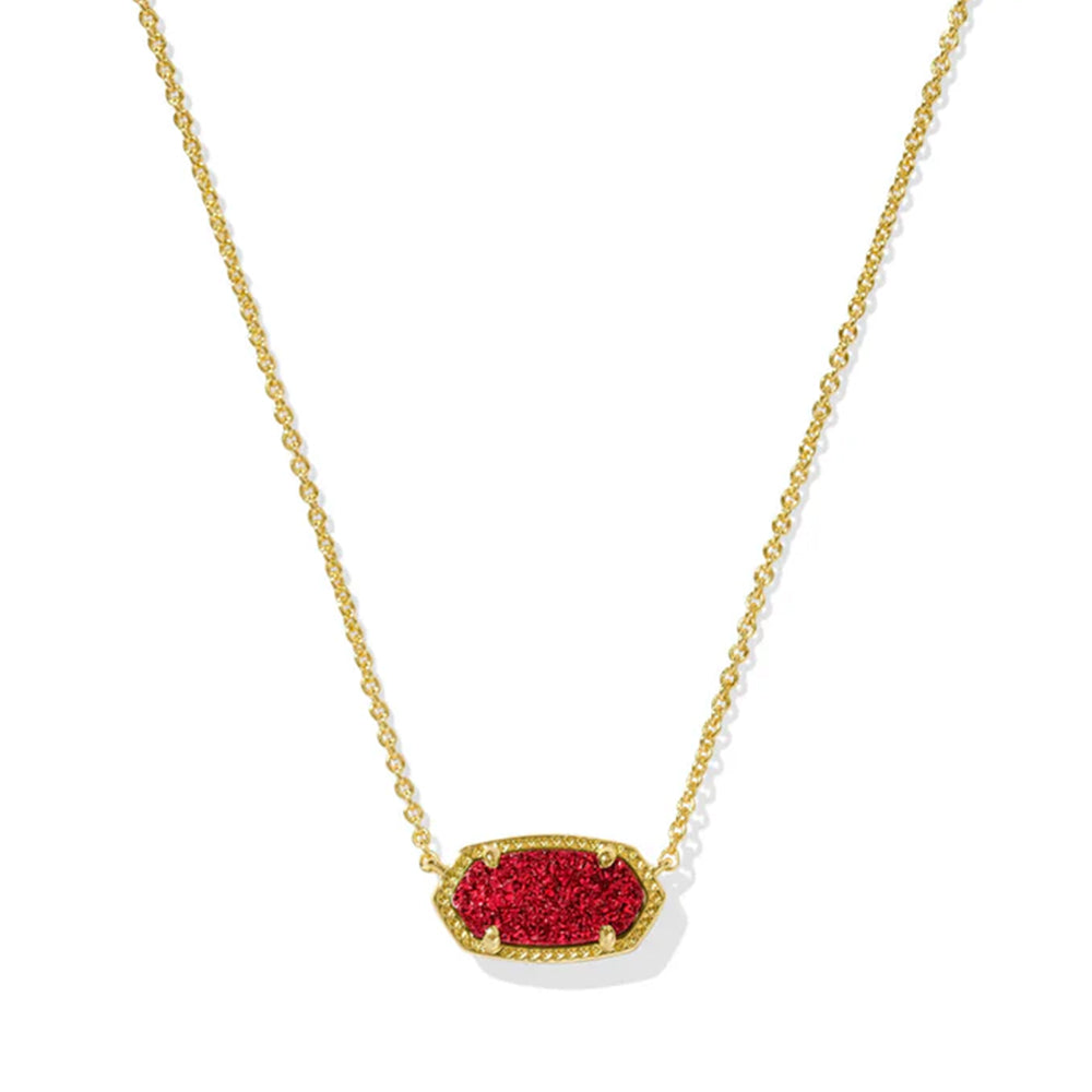 Gold necklace with a red pendant on a white background