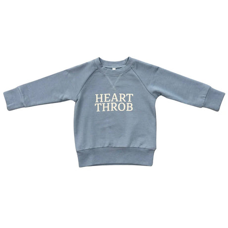 Blue sweatshirt with 'HEART THROB' text on a white background