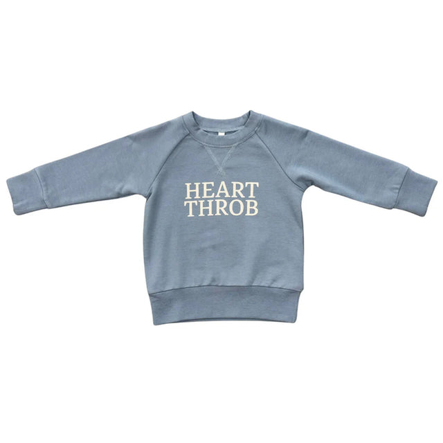 Blue sweatshirt with 'HEART THROB' text on a white background