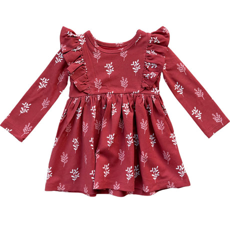 Red dress with white floral patterns on a white background