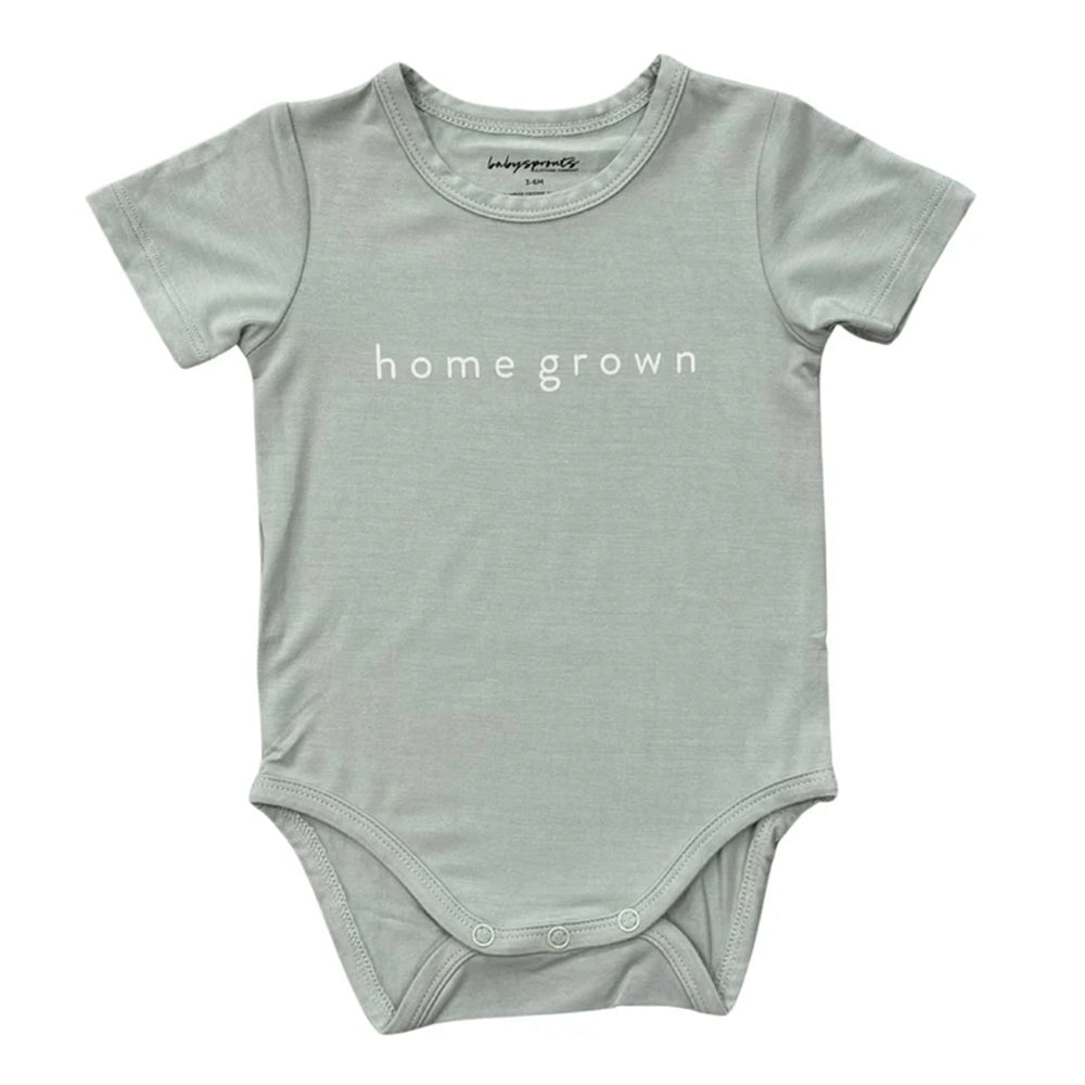 Light gray baby onesie with 'home grown' text on a white background