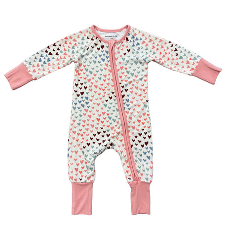 Baby onesie with heart pattern and pink accents on a white background