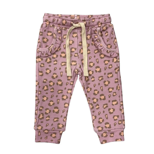 Pink leopard print pants with a yellow drawstring on a white background