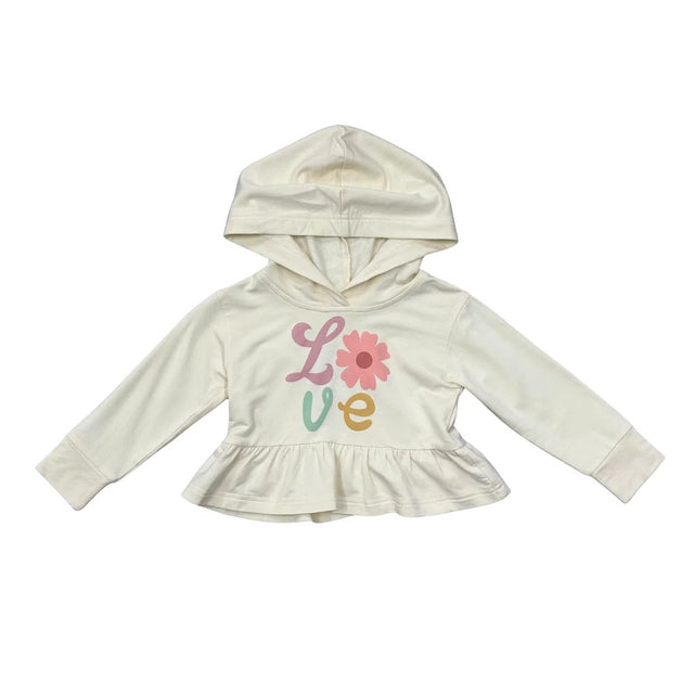 An off-white long-sleeve hooded sweatshirt for toddlers, featuring a ruffled hem and a colorful graphic on the front spelling 'Love' with a flower motif, displayed on a solid white background.