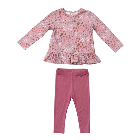 A toddler girl's two-piece clothing set featuring a long-sleeve top with a pink floral pattern and ruffle hem, paired with matching solid dusty rose leggings, shown on a plain white background.