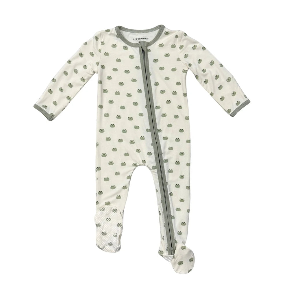 Baby onesie with green pattern on a white background