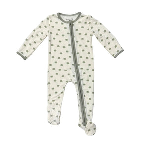 Baby onesie with green pattern on a white background